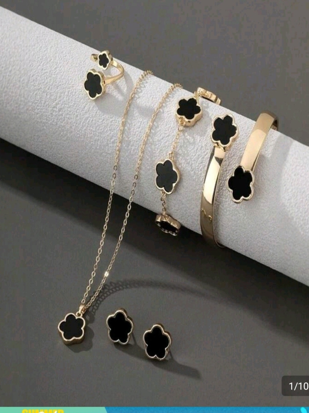 Gold-Tone Necklace with Black Clover Pendant - Elegant Women’s Jewelry